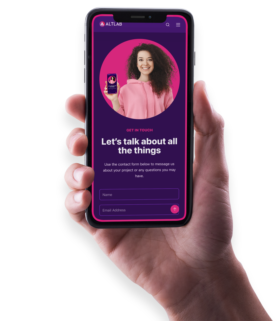 Hand holding smartphone with image of curly haired woman on screen