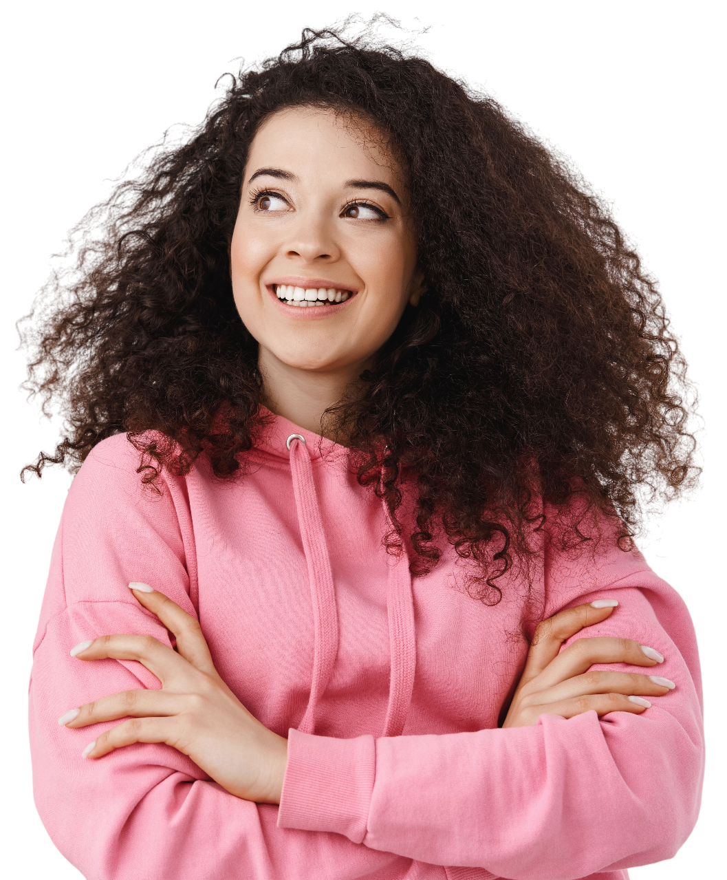 Curly haired girl smiling with arms folded and looking up